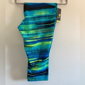 🔥🔥NWT Xersion fitted Capri leggings vibrant blues and yellow